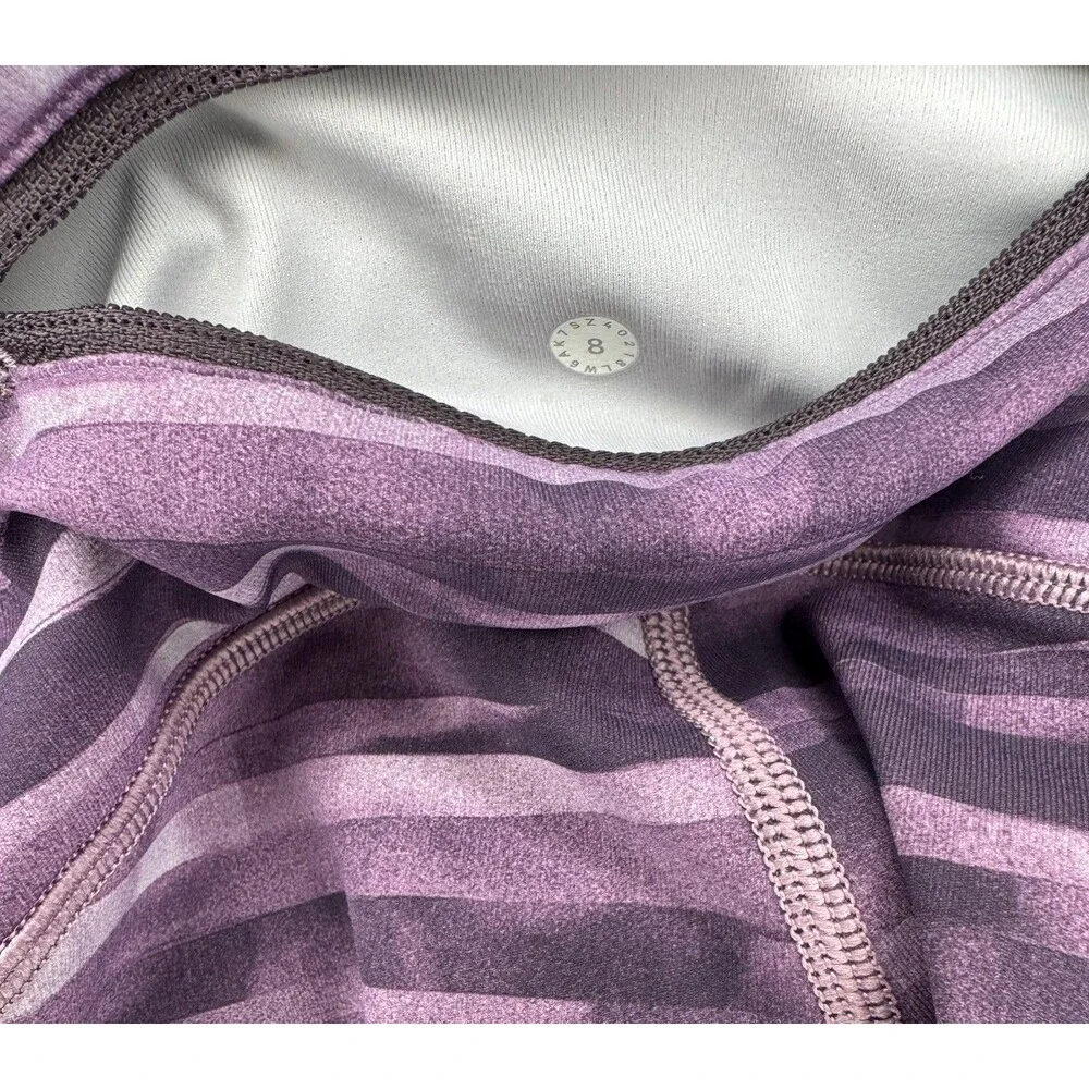 lululemon cropped purple leggings size 8 speed it up zip waist pocket